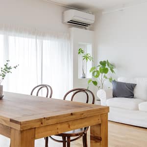 simple living room with air conditioner  